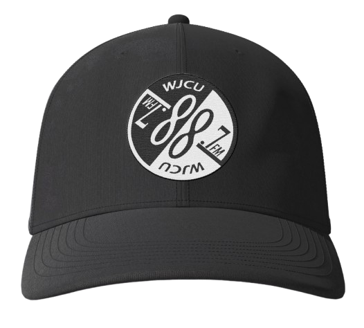 A mockup of a dark baseball cap with a large WJCU logo centered on the front