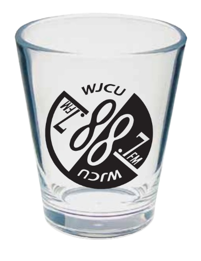 A mockup of a shot glass with the WJCU logo on it